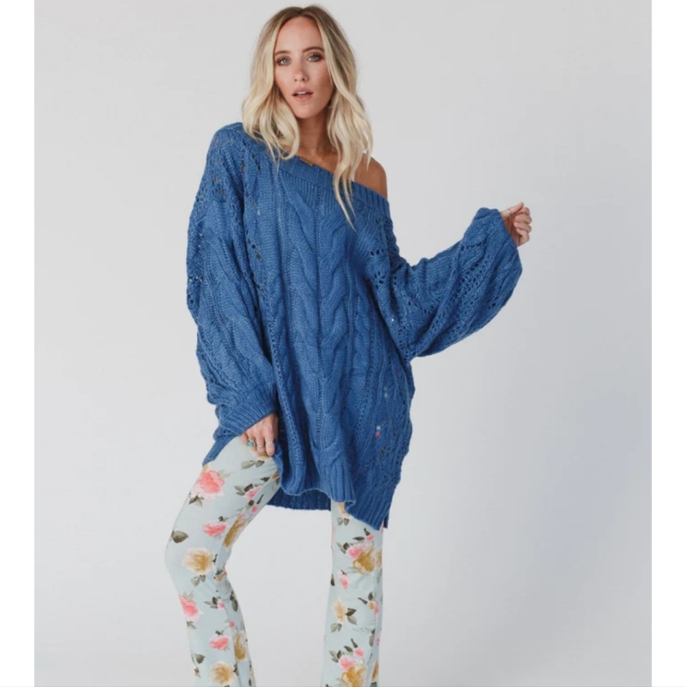 Sweater dress available in blue or black - Picture 2 of 3